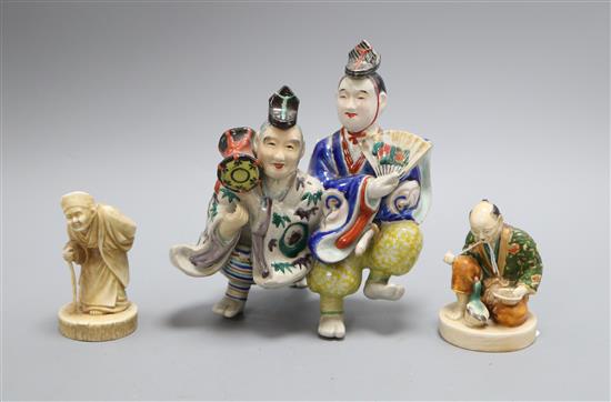 Three Japanese porcelain groups or figures